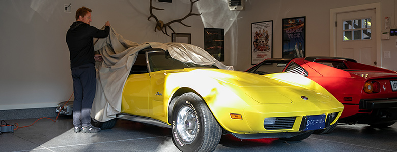 sports cars being uncovered